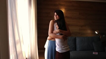 Parent-child therapy concept. Family bonding. mother and daughter practicing secure attachment through loving embrace. Mental Health, psychological topics