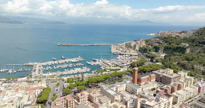 Aerial view of the port of Gaeta, overlooking the Tyrrhenian Sea. It is located in the province of Latina, Lazio, Italy. In the foreground is the modern district of the city.