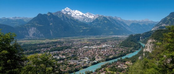 Aerial View of Interlaken Switzerland with Turquoise River and Snow Capped Alps Mountains in Summer Landscape Photography