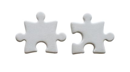 Two white puzzle pieces with one missing