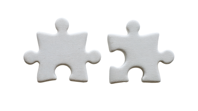 Two white puzzle pieces with one missing