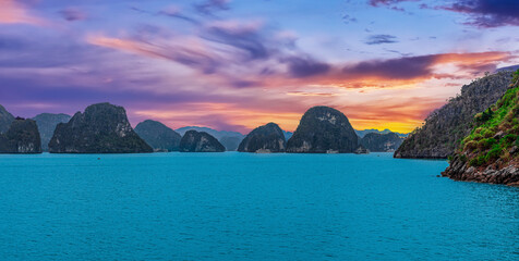 Halong Ha Long Bay Hanoi this Vietnamese wonder is littered with mountains and Rock cliffs popping...