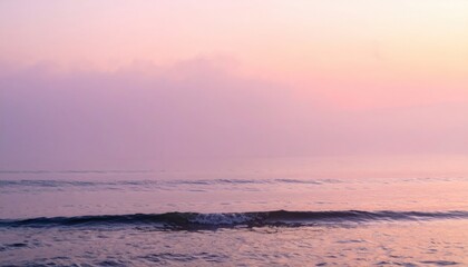 Fototapeta premium Serene sunset over calm ocean coastal landscape tranquil seascape soft colors peaceful atmosphere