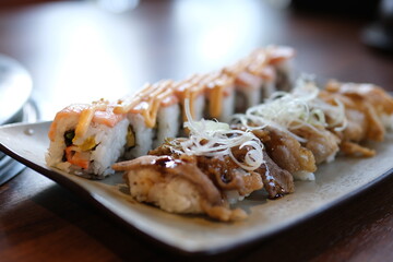 sushi with pork with beef fried meat with salmon grilled red fish salmon asian cuisine experiments different types