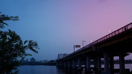 Fototapeta premium Sunset Bridge in the Cityscape