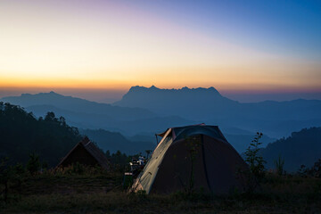 Obraz premium Beautiful landscape of sunrise at Doi Luang Chiang Dao Mountain Peak viewpoint in the National Park has and important ecosystem. It is the second-highest mountain in Chiang Mai, Thailand.