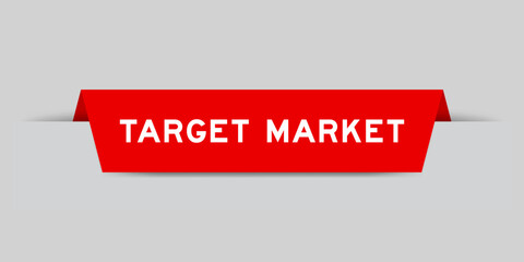 Red color inserted label with word target market on gray background