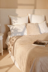 Cozy and Comfortable Bedroom with Soft Linens and Warm Lighting