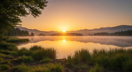 Serene Sunrise over Misty Lake and Mountain Range Golden Hour Landscape Photography
