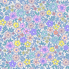 Beautiful cute floral pattern in small flowers. Small pastel multicolor flowers. White background. Ditsy print. Floral seamless background. Gentle hand drawn template for fashion prints. Stock pattern