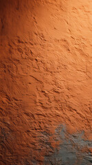 Fototapeta premium A rustic terracotta wall embodies autumn's warmth, echoing ancient clay traditions, capturing the spirit of Moroccan delight or Utahs dusty red deserts