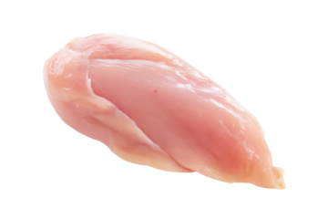 Close up shot of a raw chicken breast fillet isolated against a solid black background in a studio setting on transparent background