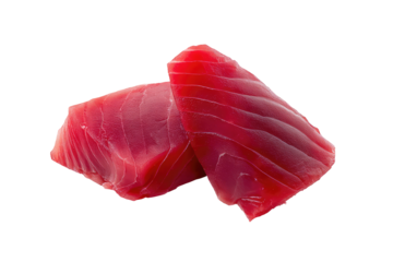 Close up of two pieces of fresh raw tuna with a vibrant red color isolated against a black background on transparent background