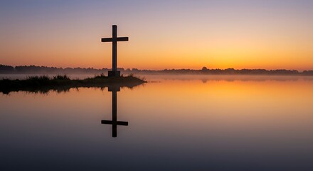 Cross Silhouette at Sunrise over Water