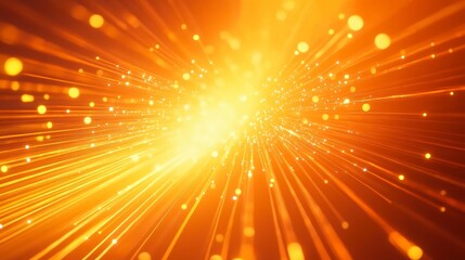 Abstract orange light burst with sparkles and glowing particles.