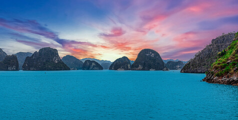 Halong Ha Long Bay Hanoi this Vietnamese wonder is littered with mountains and Rock cliffs popping...