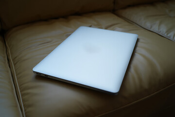 MacBook Air on Beige Couch Lifestyle