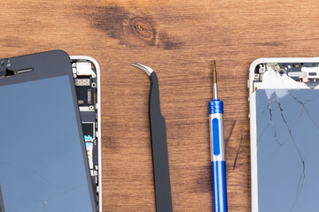 using special tools to repair the phone display, close-ups