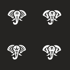 Fototapeta premium Elephants Head Icon Pattern: A meticulously crafted pattern showcasing the majestic presence of an elephant's head, designed with an artistic and stylized flair, against a dark backdrop.