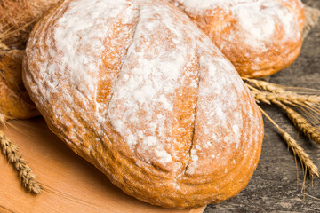 Homemade natural breads. Different kinds of fresh bread as background, perspective view with copy space