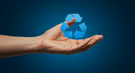 Adult hand holding a blue recycle symbol centered. Visual concept of environmental responsibility, eco friendly solutions, and protecting the planet through waste management efforts.