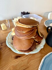 traditional full turkish pancake breakfast on wooden table