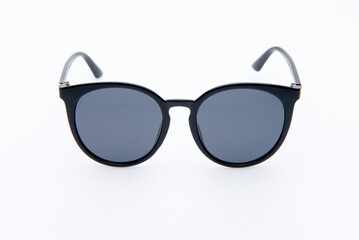 Fashion sunglasses black frames on the white background.