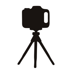 Silhouette of camera on tripod ready for photography and videography