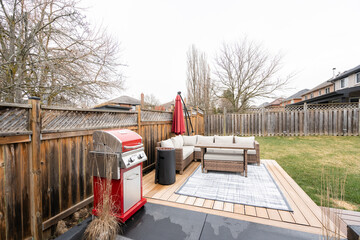House Backyard with Barbeque and Seats