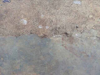 Weathered Concrete Surface with Distinct Texture Divide
