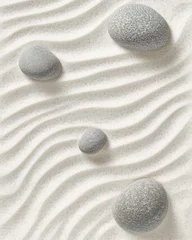 Photo sur Plexiglas Minimalist zen garden with smooth gray stones on raked sand top down view for meditation and relaxation concept