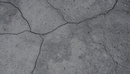 Obraz premium Cracked Concrete Surface: Close-up of Cement Texture for Background or Overlay