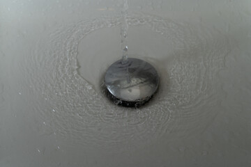 Close up of splashing water from a fountain or shower head
