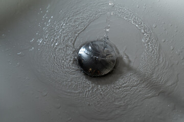 Close up of splashing water from a fountain or shower head