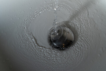 Close up of splashing water from a fountain or shower head