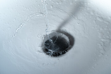 Close up of splashing water from a fountain or shower head
