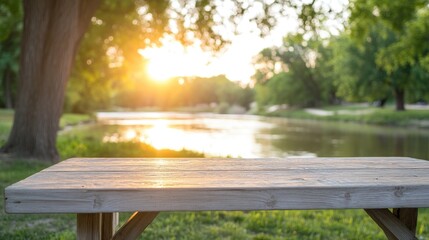 Naklejka premium Wooden picnic table outdoor park sunset