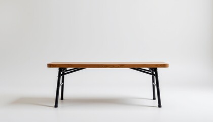 Modern, minimalist wooden table with black metal legs on a neutral background for contemporary interior design projects