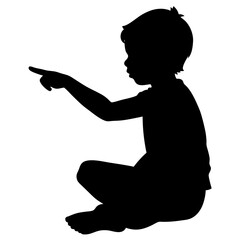 Silhouette of a child sitting and pointing