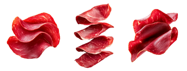 Set of thin slices of cured meat Bresaola with marbled texture isolated on white transparent background, concept of delicacy.