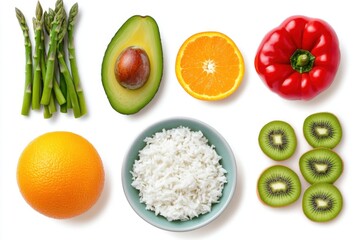 Healthy Food Flat Lay Overhead: Asparagus Avocado Orange Bell Pepper Rice Kiwi on White Background