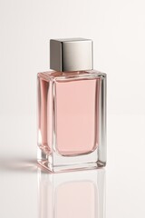 Elegant square glass bottle with pink liquid perfume and silver cap on reflective white surface