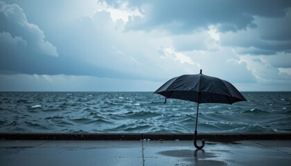 a solitary, weathered umbrella, its canopy slick with rainwater, stood sentinel in a turbulent sea of dark clouds overhead, its presence a defiant beacon against the relentless downpour.