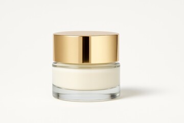 A luxurious cosmetic cream jar with a shiny gold lid and white cream inside, placed on a light neutral background
