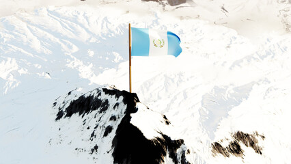3D rendering of the Guatemala national flag featuring two sky blue vertical stripes with a white center displaying the national coat of arms, fluttering atop a snow-covered mountain peak.

