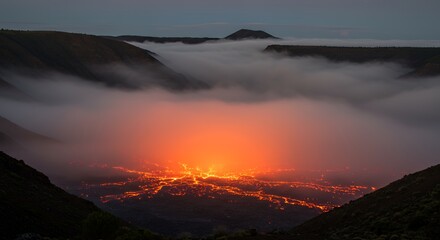 Lava Flowing in Valley Underneath Fog