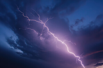 Powerful lightning bolt illuminates night sky, cutting through dark storm clouds with vivid purple hue, creating dramatic and electrifying scene
