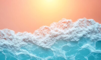 Soft waves with white foam gently washing up on a sandy beach creating beautiful patterns under a warm sunset glow