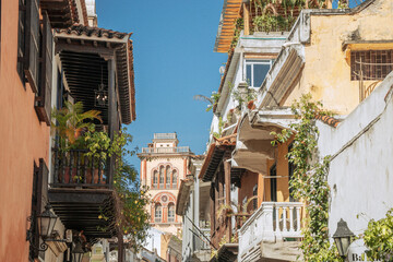 Panoramic scene of vibrant balconies on Caribbean colonial buildings