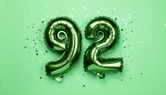 Number 92 with ballons on light green background.   